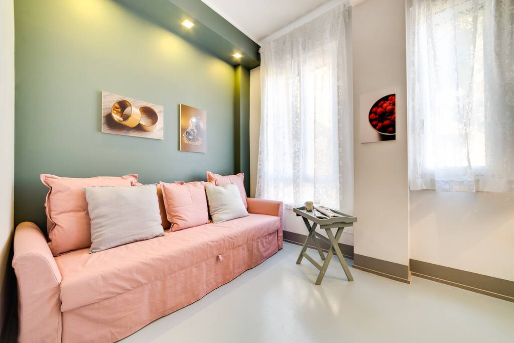 the living room with one of the sofa bed