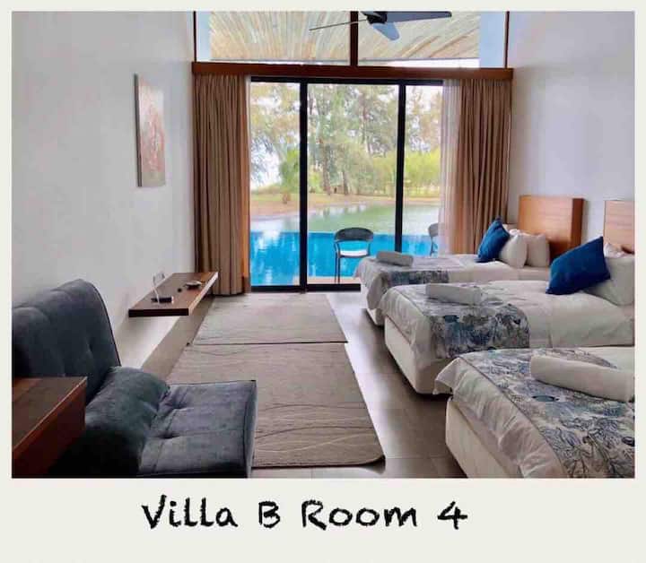 Room 4 with 3 single beds with views of the pool, lake and sea.