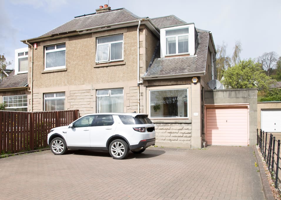 Front of the house with private parking