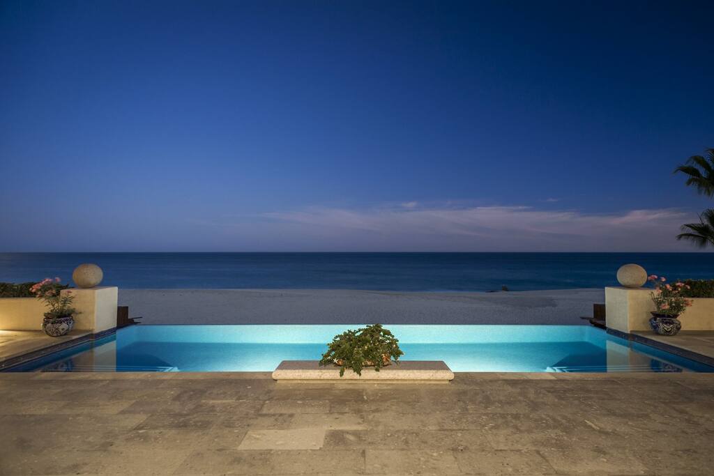 Pool with view of beach