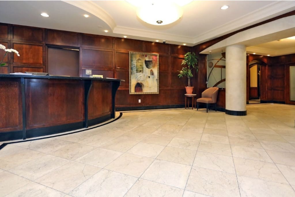 Front entrance of condo with doorman
