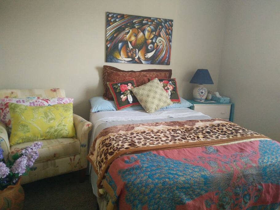 guest bed room with a full size bed. Clean and comfort.