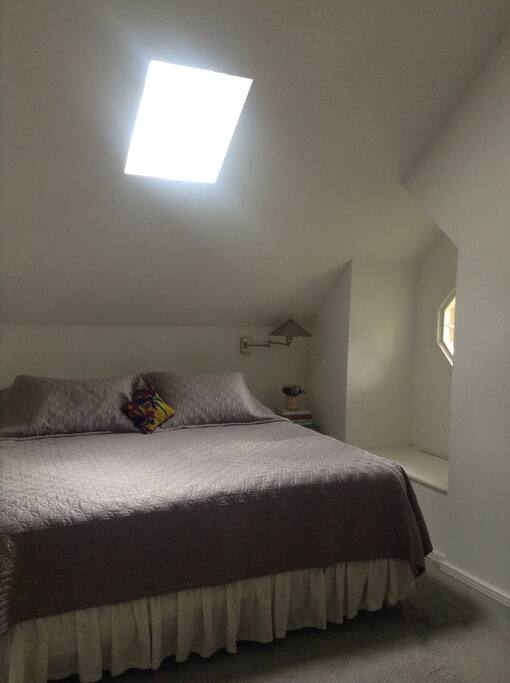 In loft, Master king upstairs with skylights, sitting room with fireplace.