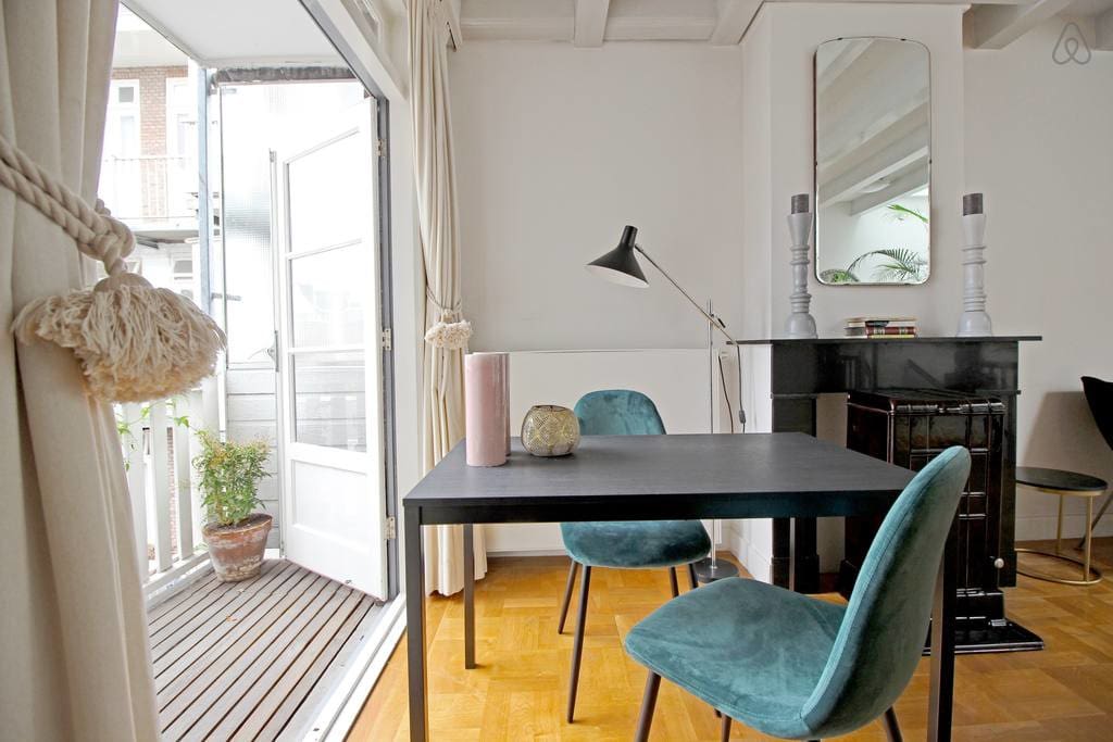 Nice breakfast table with a balcony