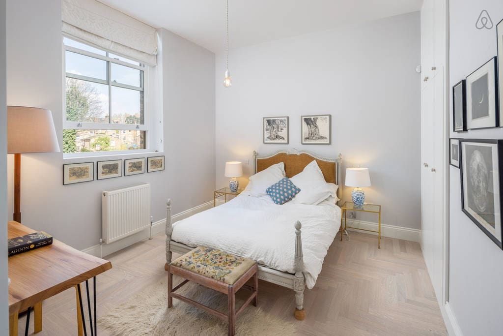 Bedroom 1 is spacious and has a comfy bed with plenty of storage space.