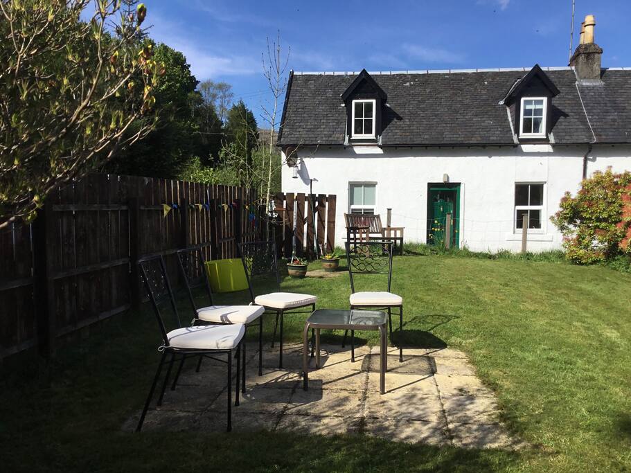 Sunbathing in Cuil Cottage, overlooking Loch Fyne.