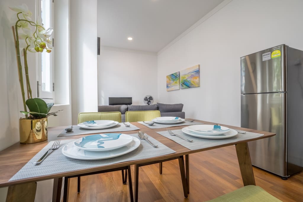 Living Room with Dinning Table and Fridge