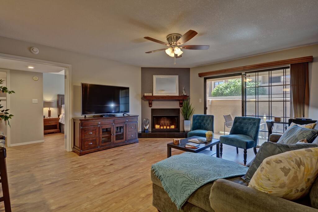 Lots of natural light, new flooring, new furniture, 60 inch flat screen, and plenty of seating.