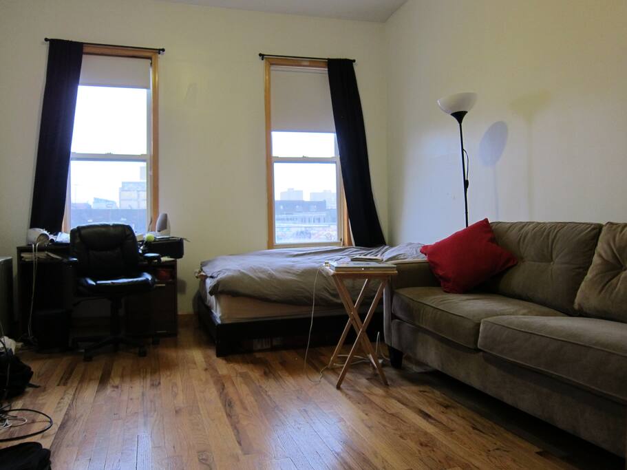 High ceilings, with room for a full size bed, desk, and a couch!