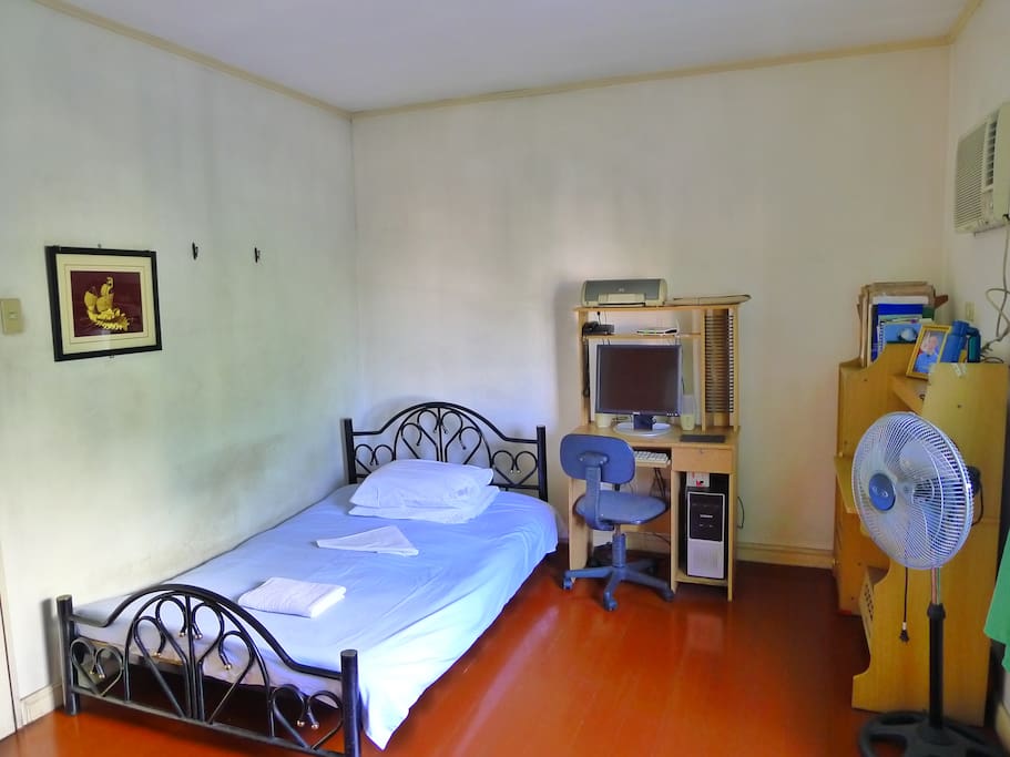Very spacious room that can accommodate up to 3 people. Room has air conditioner and fan plus a study table.