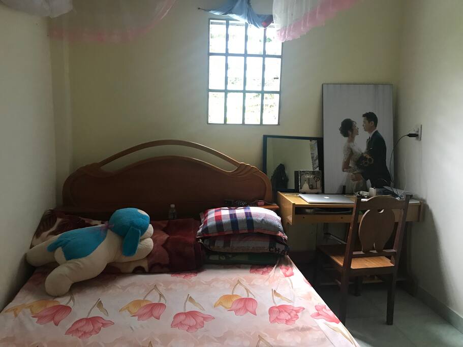 A small room is good for 2 persons. Enough bed, table & wardrobe