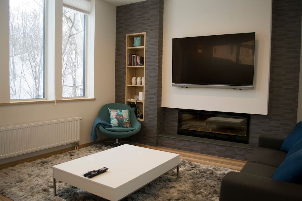 Kick back in the lounge equipped with 60" TV, Apple TV and High Speed Internet