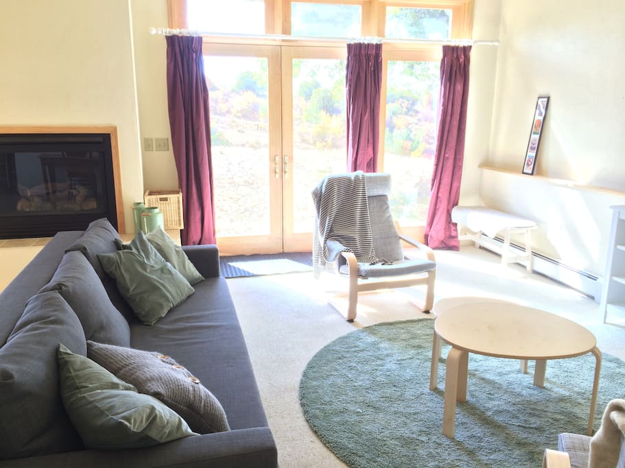 Living room with TV on right out of view (dish network, dvd player).
