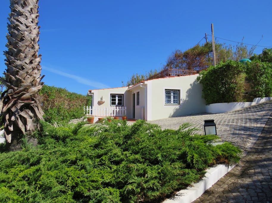 Parking space and house´s south façade