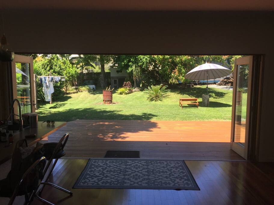 Bifold doors open out onto the deck and backyard