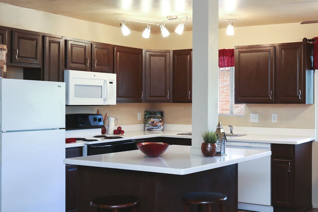 Kitchen has pots, pans, dishes, coffee maker and more. Some basic spices and ingredients are provided as well.
