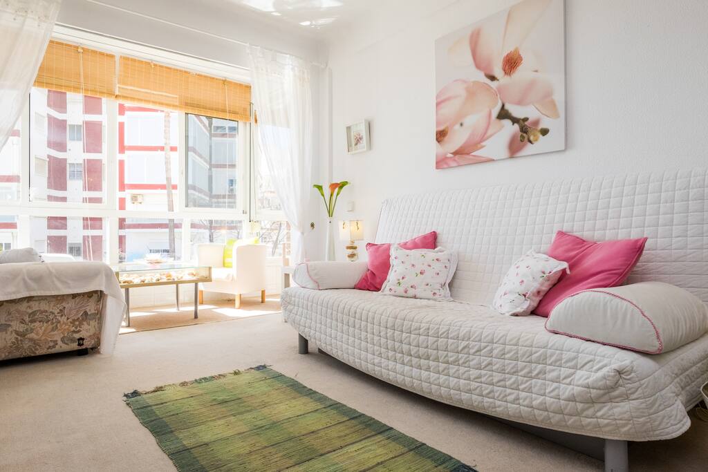 Living room with TV and DSTV and balcony