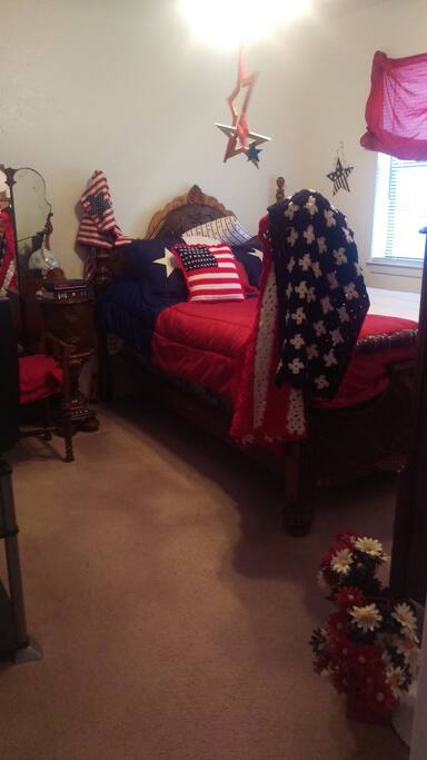 Full size bed/hooks for hanging items/TV/Clock
