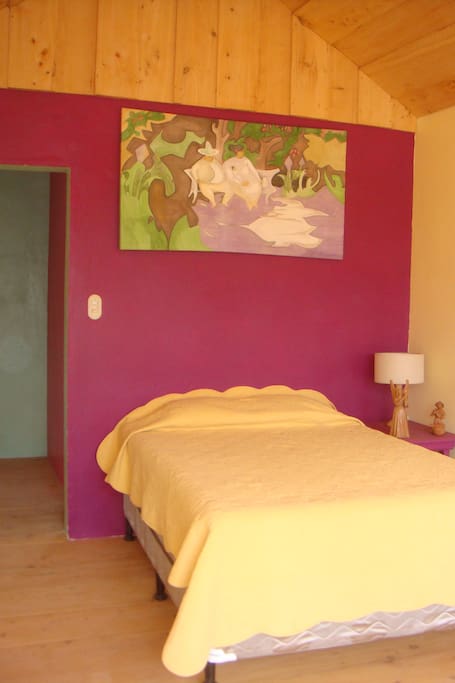 La chambre principale, avec une superbe vue sur le volcan.