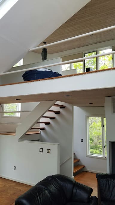 Staircase from living room to upstairs loft