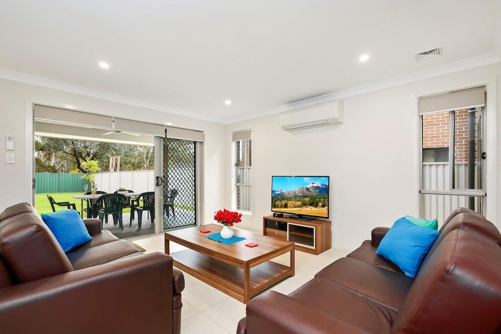 Spacious and Comfortable Living Area with Access to the backyard