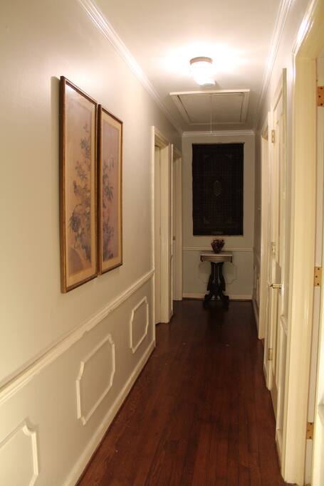 The hallway to your bedroom, first door on the left. Bathroom is to the right.