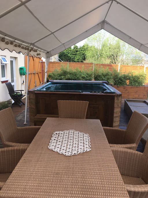 six person hot tub with the lounger