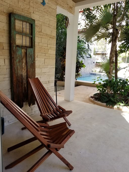Pool view from the living room outdoor patio. Enjoy your own private roof fan outdoors on the patio.