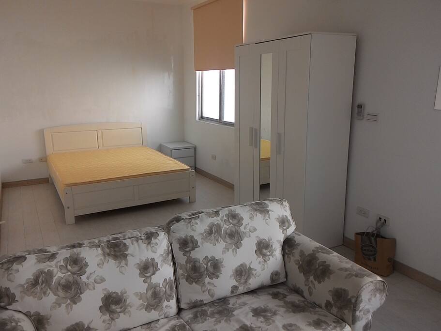 living room with bed