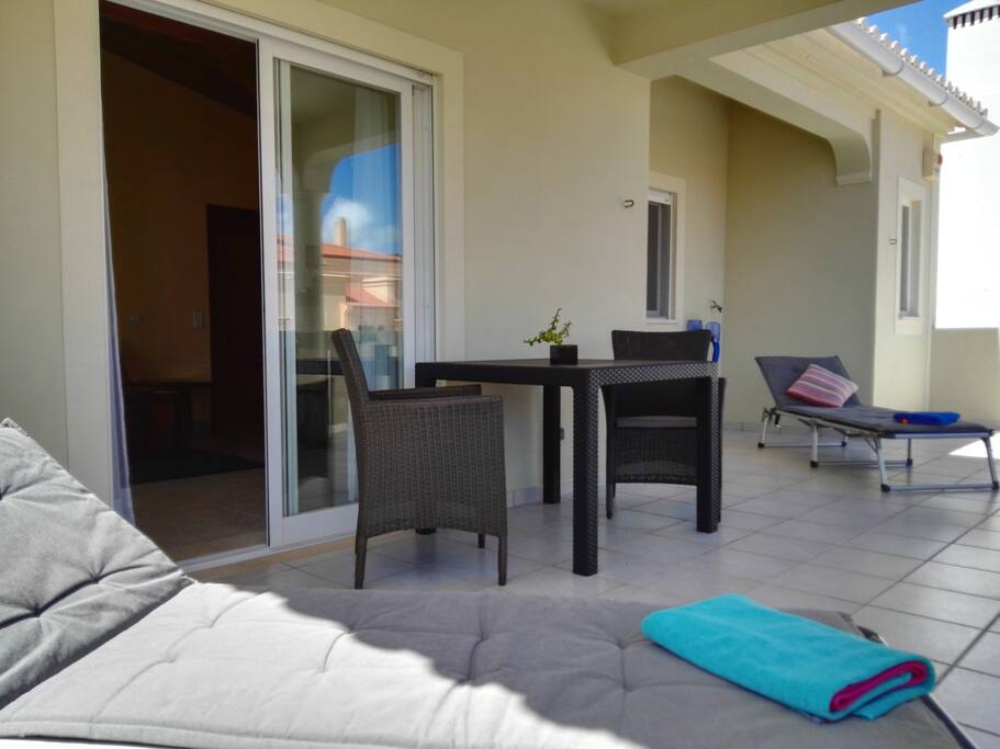 spacious 30m2 furnished terrace (semi-covered)