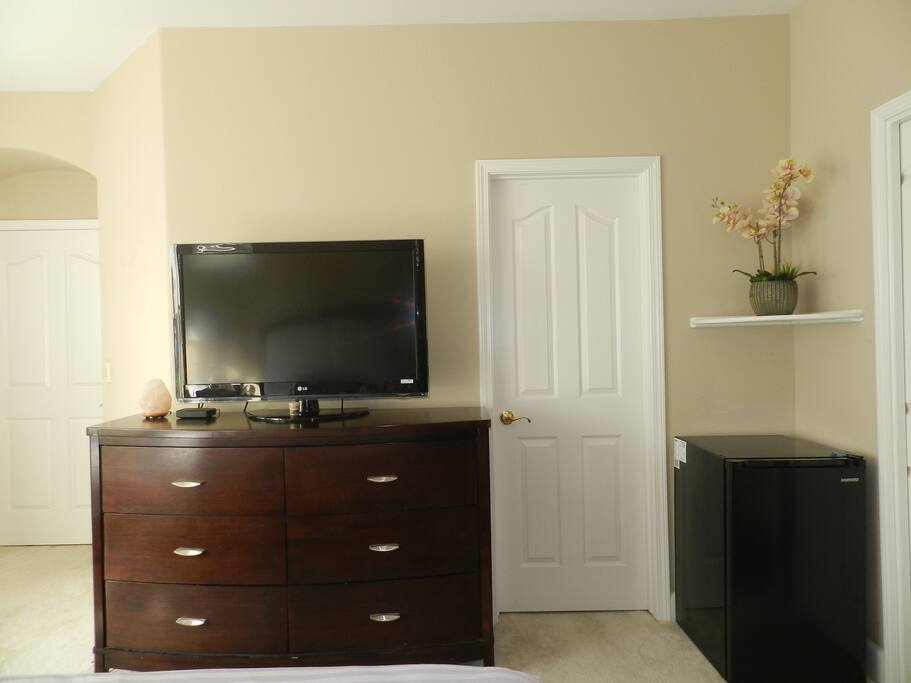 TV and mini-fridge with refreshments