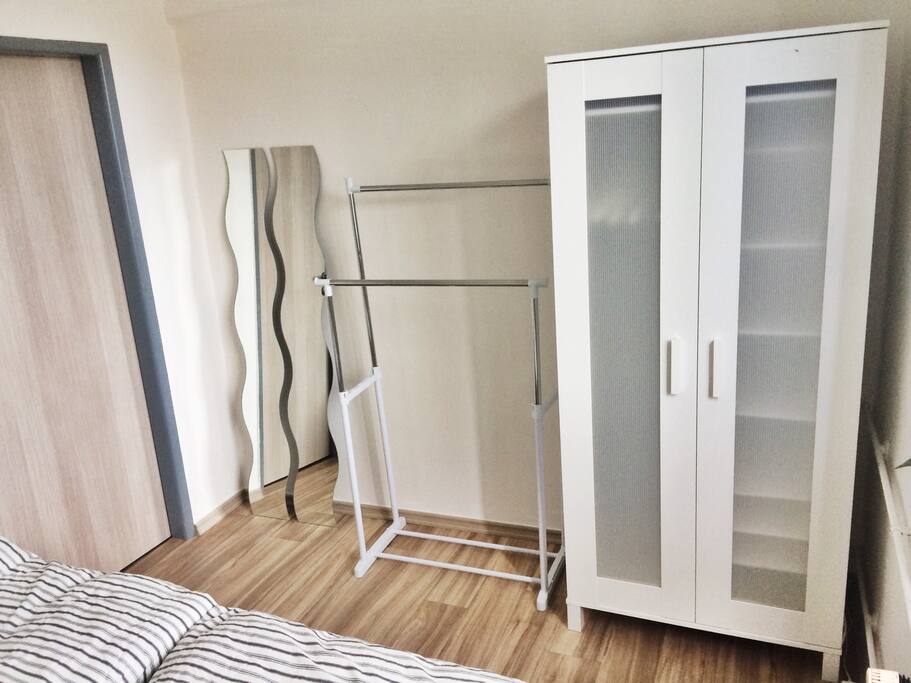 Wardrobe and a coats hanger.