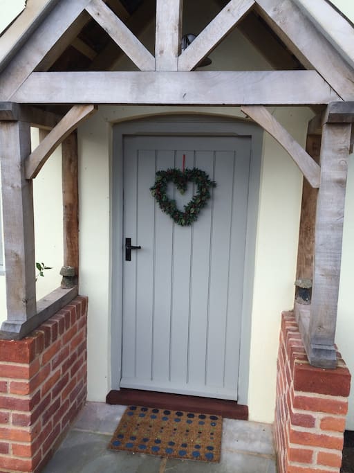 At Christmas Barn Owl Cottage's festive front door.