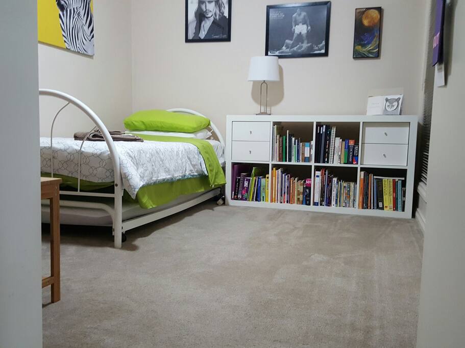 Spacious 'ALI Room" with SINGLE bed. Chest of drawers and towel rack provided. Clothes hanging rack available if desired.