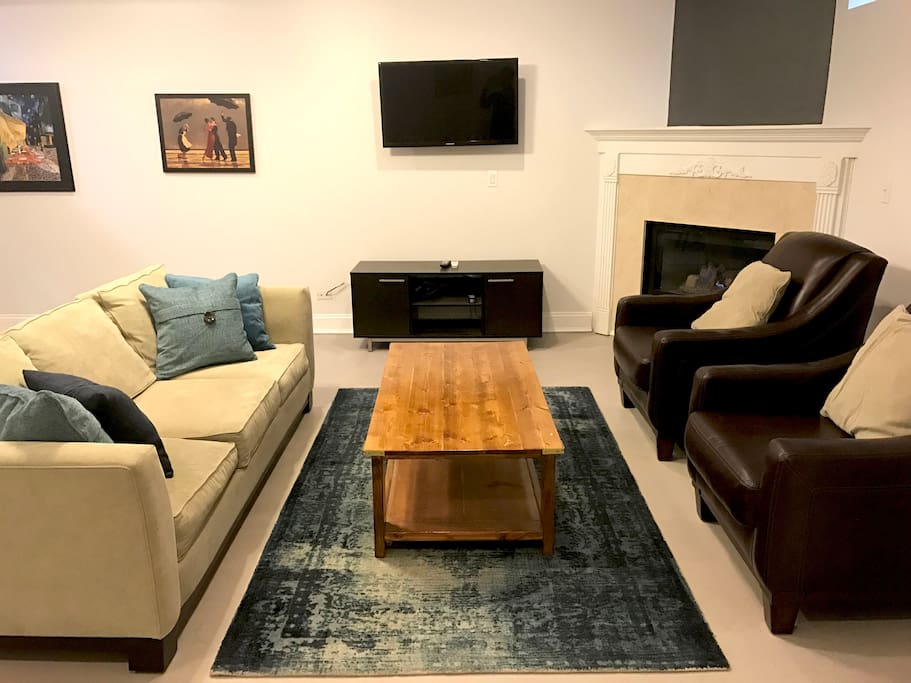 Living room includes pullout queen size mattress, fireplace and cable tv