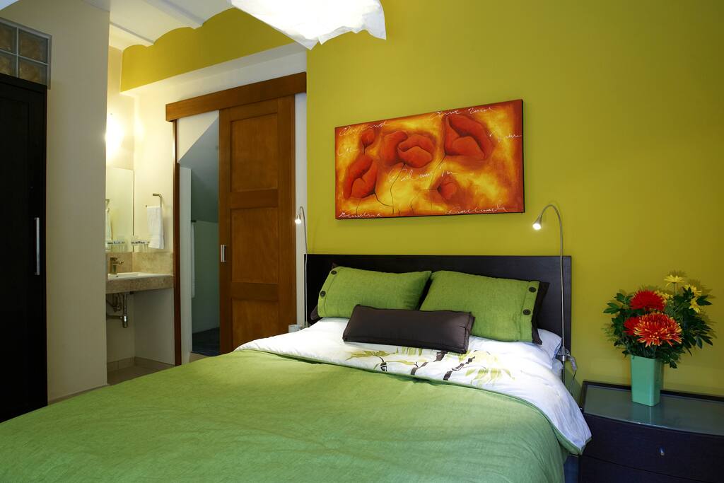 Second bedroom with one queen and one single bed