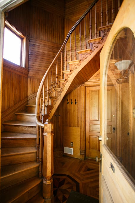 Spiral staircase leads up to private apartment