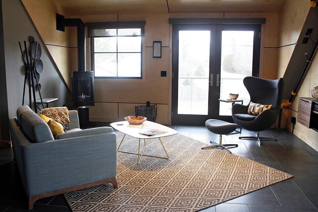 Sitting area with propane stove and access to outside deck