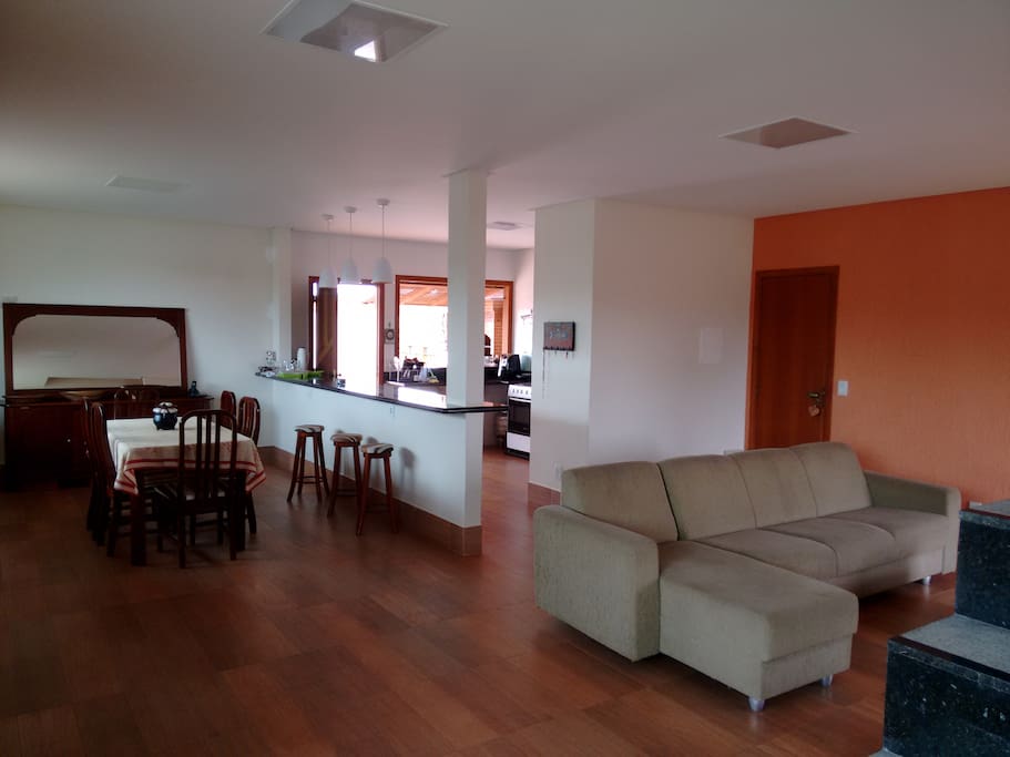 The room and the pantry integrate harmoniously with the kitchen.