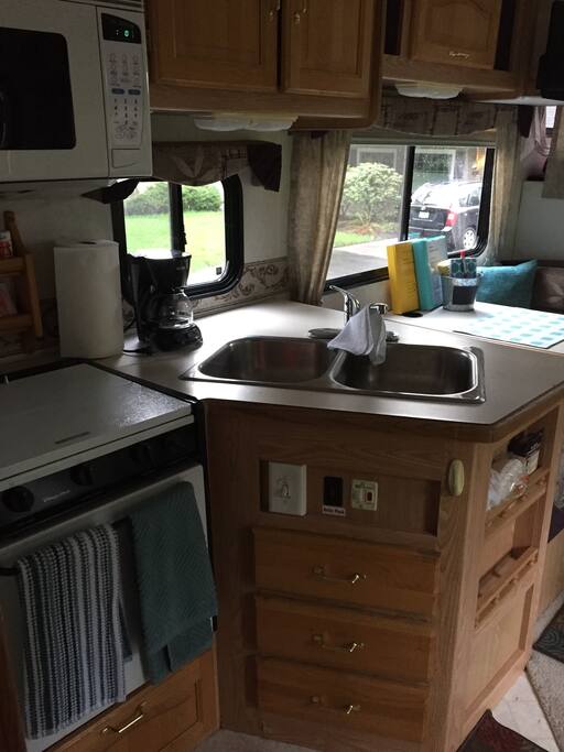 Kitchen area with gas range and oven
