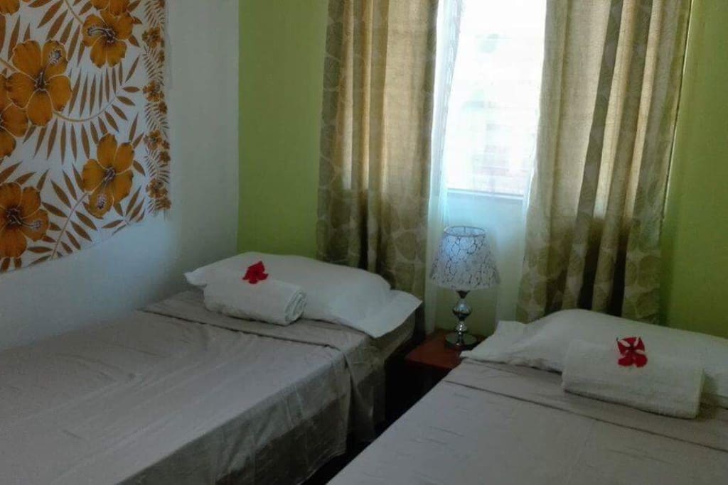 Room #2 with 2 singles beds