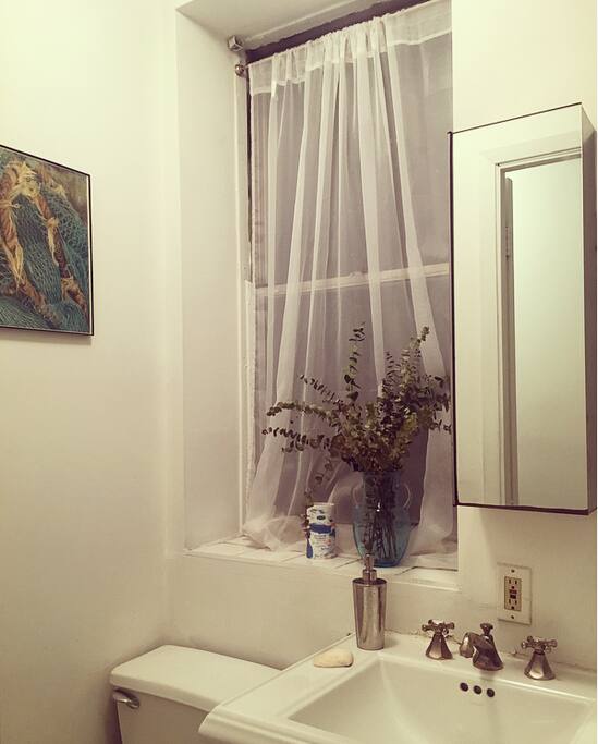 The bathroom is newly renovated with a large medicine cabinet at your disposal. Enjoy fresh towels, shampoo and conditioner, body wash and q-tips.