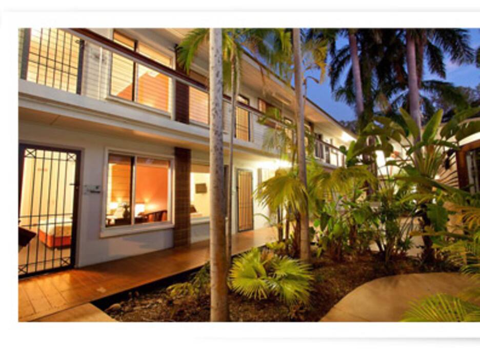 Rooms open onto common area gardens