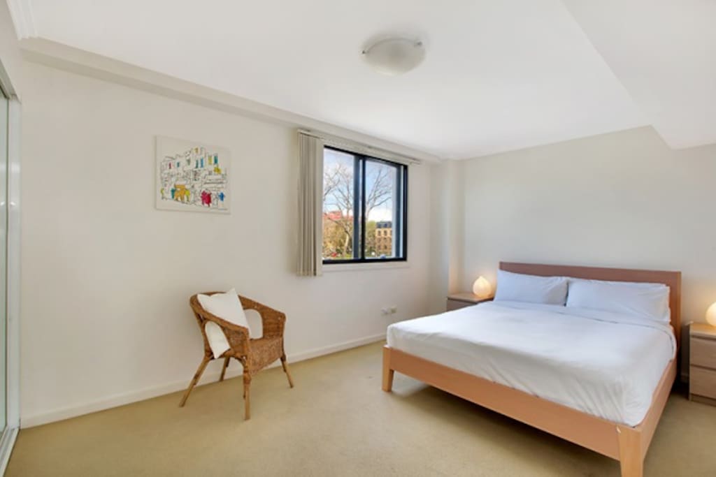 Double bedroom with built in wardrobe and double glazed windows.
