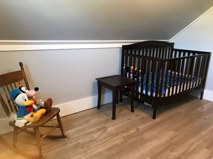 Bedroom 2 - A nursery with a twin bed is just off the room with two double beds (previous photo). Perfect for a young family!