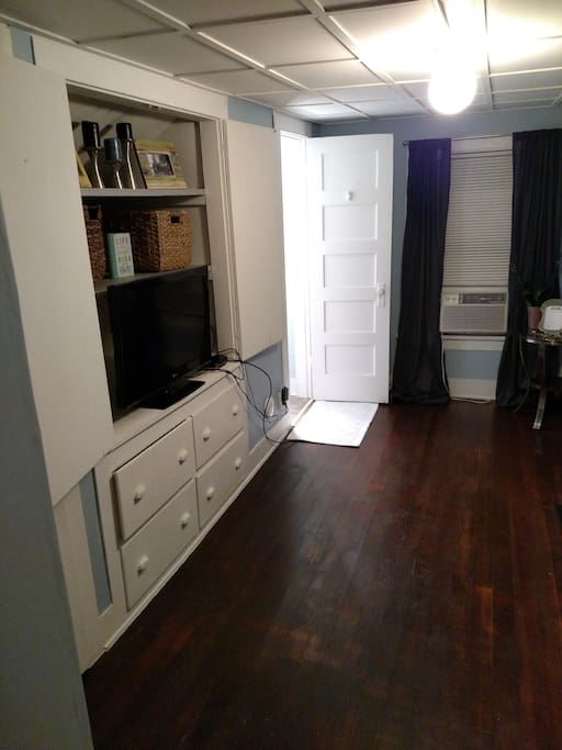 Dish cable tv hooked up, and closet space with hangers.