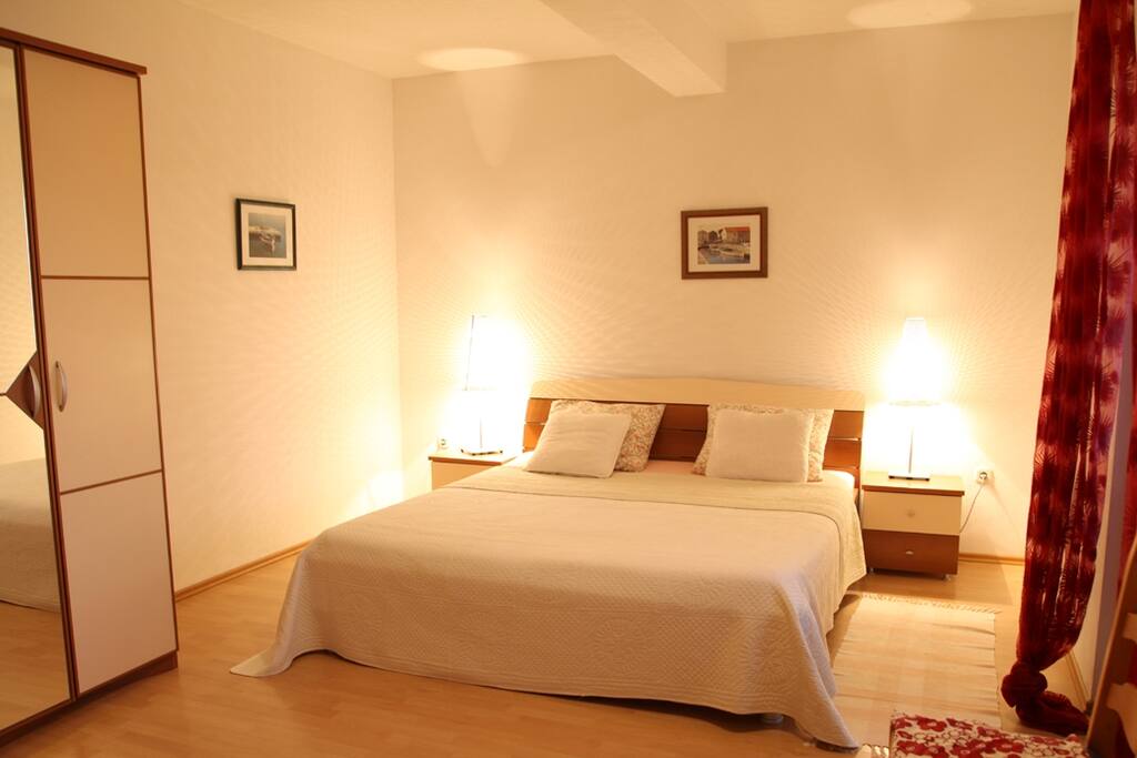 Bedroom number two with a king and single bed