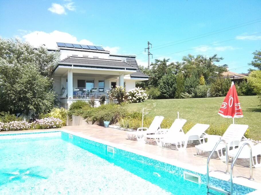 Swimming pool and house.