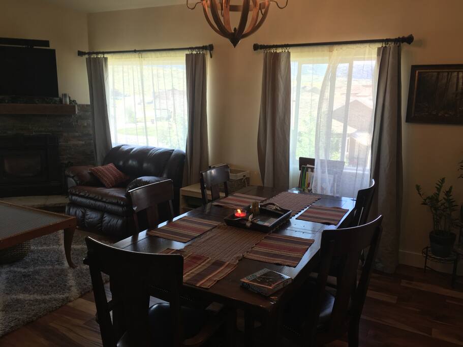 Dining table can extend to seat 10.