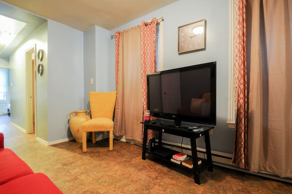Watch your games, movies, videos, or just lounge at the living room area